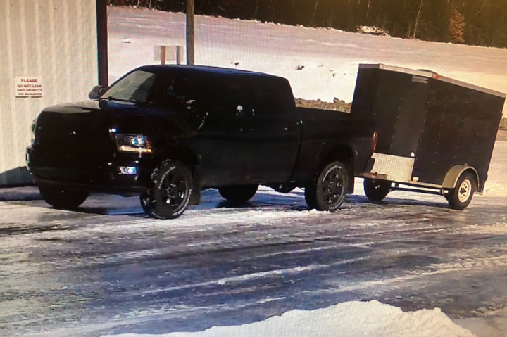 Video surveillance shows two pickup trucks on the property at the of the incident.