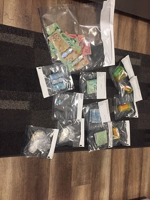 Bay Roberts RCMP seizes a quantity of drugs and cash following the search of a Bay Roberts residence on March 20, 2020.
