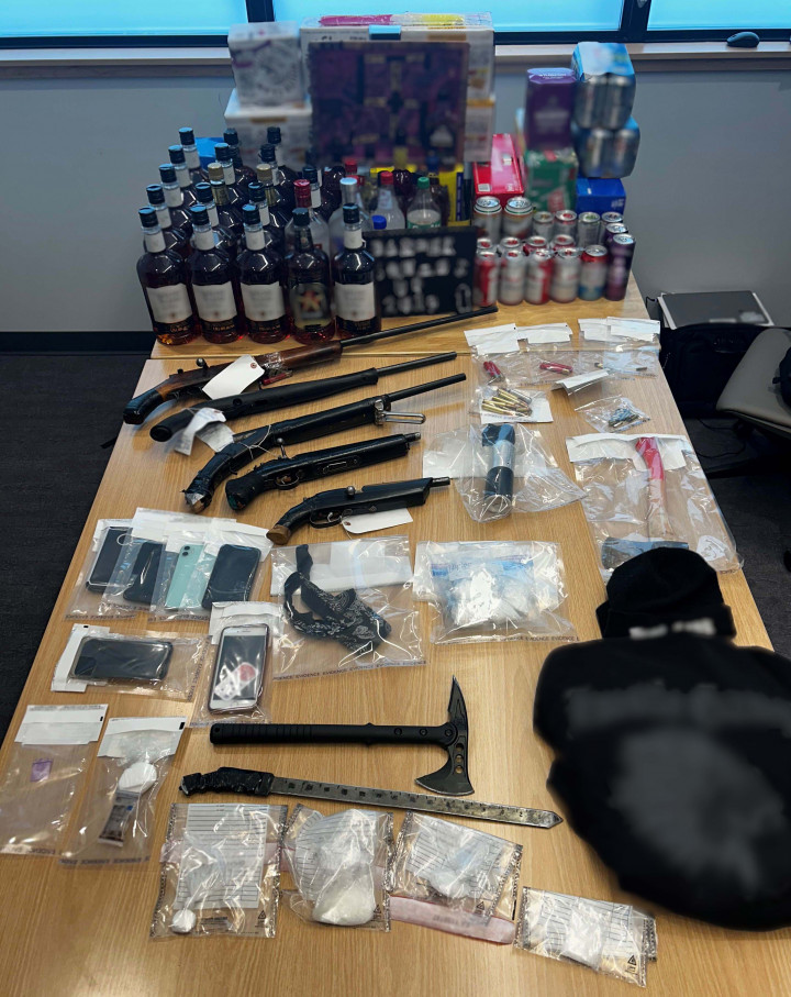 seized four firearms, one of which was loaded, approximately 170 grams of cocaine, approximately 28 grams of methamphetamine, trafficking paraphernalia and a sum of cash. 