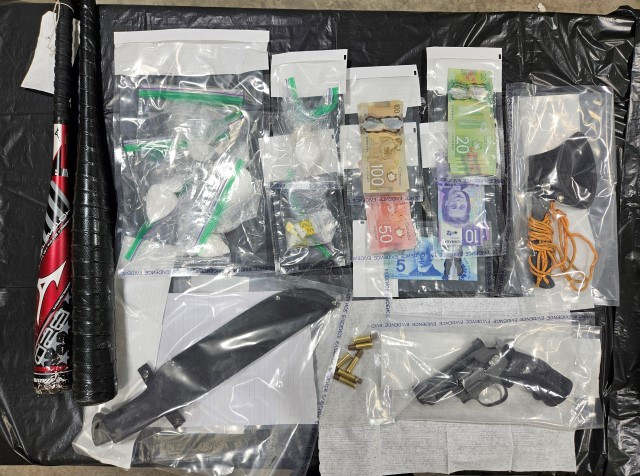 Officers located and seized approximately 107 grams of crack cocaine, 19 grams of methamphetamine, a small amount of ecstasy, a large number of knives, axes, baseballs bats, an imitation handgun, a sum of cash, and drug trafficking paraphernalia.