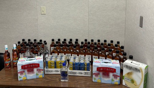 seized approximately 50 bottles of hard liquor, 48 coolers and a box of wine. 