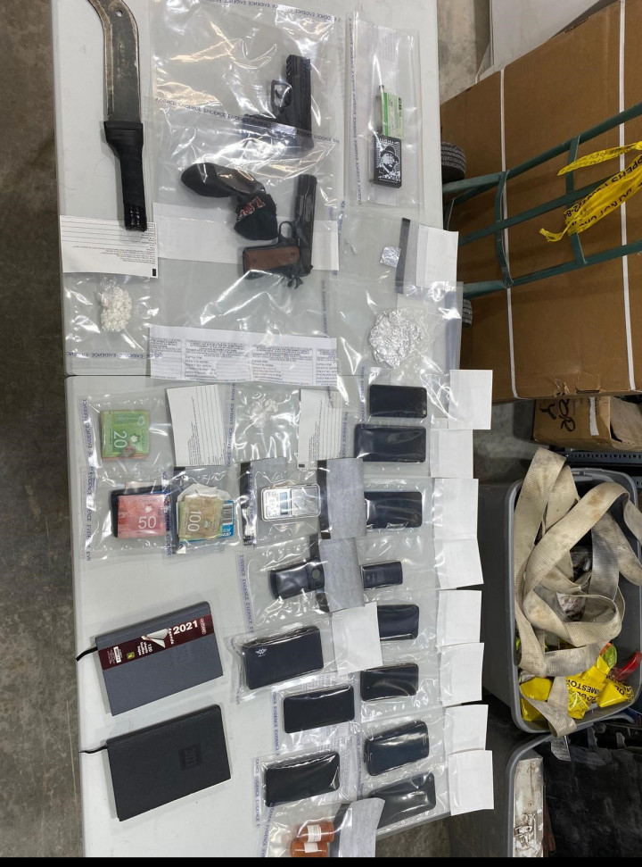 seized approximately 16 grams of crack-cocaine which was divided into small packages, two airguns, a machete, trafficking paraphernalia and a sum of cash.