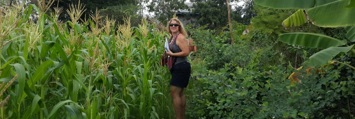 Woman standing in field.