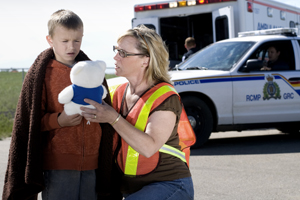 Victim Service volunteer helping a child in need