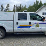 Colourfully marked RCMP police vehicle after being drawn on by children during the Colour the Cruiser event.
