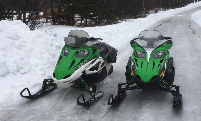 Two green Arctic Cat snowmobiles, an F8 and 570 Touring, stolen from a residence on Main Road, Chance Cove, during the early morning hours of June 29, 2019.
