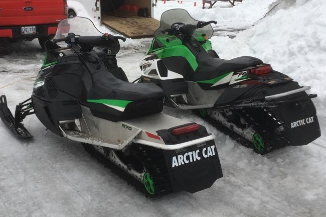 Two green Arctic Cat snowmobiles, an F8 and 570 Touring, stolen from a residence on Main Road, Chance Cove, during the early morning hours of June 29, 2019.