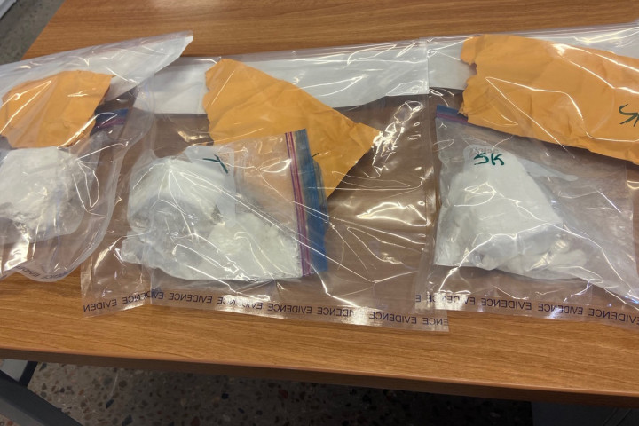 526 grams of cocaine in platic bags on a table