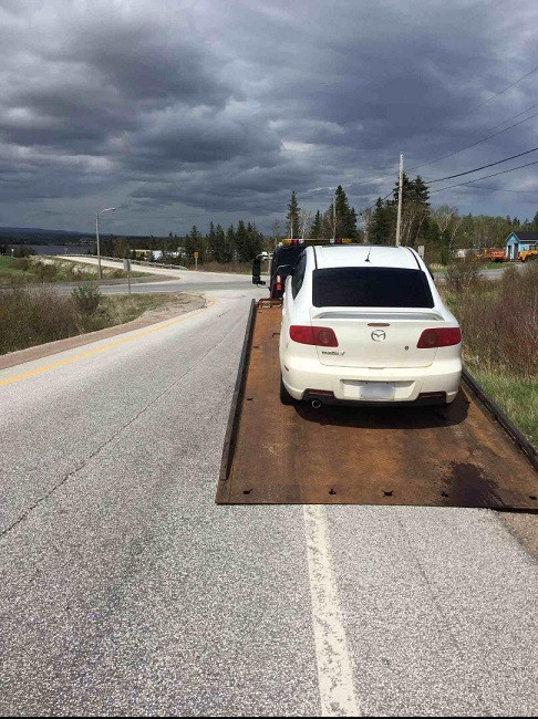 RCMP Traffic Services West seizes a Mazda 3 with expired registration and no insurance, operated by a suspended driver on the TCH near Deer Lake on June 3, 2020.