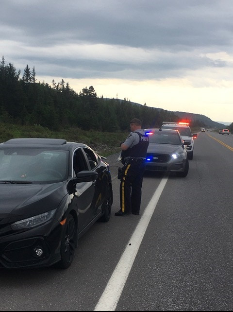 RCMP Traffic Services West stops vehicle on TCH near St Jude's and finds open alcohol, cannabis and cash on June 18, 2020.
