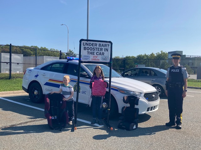 Nova Scotia RCMP and Child Safety Link demonstrate Child Passenger Safety Week