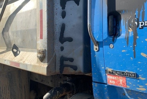 Heavy equipment was vandalized in Grand Falls-Windsor, spray painted with the abbreviation 