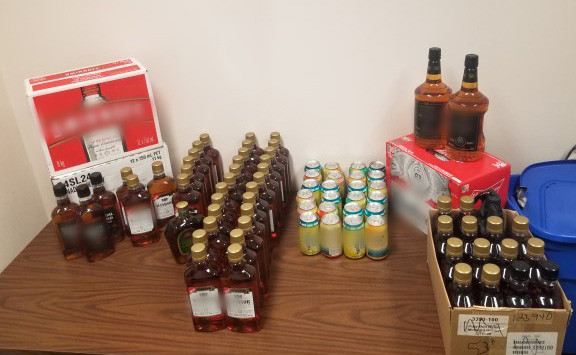 76 - 750 ml bottles of whiskey, two 1.75 liter bottles of whiskey, one 30 pack of beer and a 24 pack of twisted tea