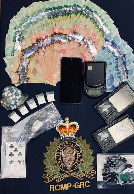 Cocaine, prescription pills, drug paraphernalia consistent with trafficking, and cash seized from a home in Deer Lake on August 11, 2021.