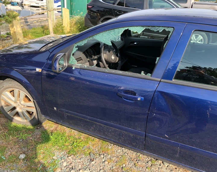 This vehicle had its windows smashed in a break, enter and theft that occurred on August 16, 2021.