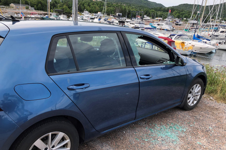 This vehicle had its windows smashed in a break, enter and theft that occurred on August 16, 2021.