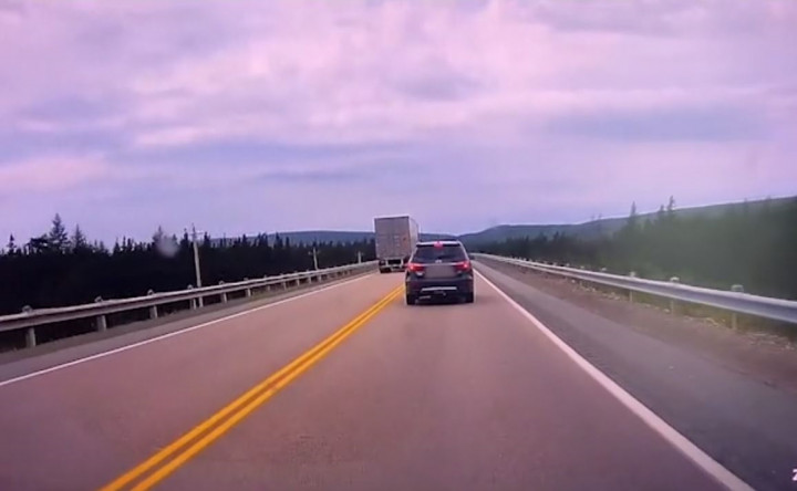 Tractor trailer passes on a solid line on the TCH on August 23, 2021, putting other motorists at risk.