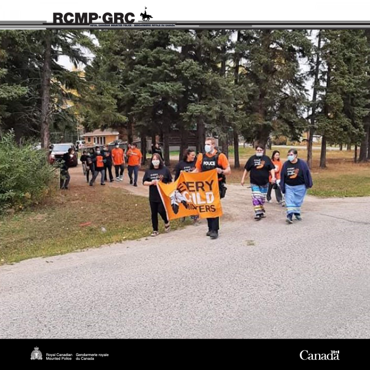 Officers and employees from across the province took part in ceremonies and events in their communities – from painting detachment sidewalks with orange handprints, participating in Truth and Reconciliation awareness walks, carrying and raising Reconciliation flags and banners, to setting up a tipi at a local school – in the spirit of connecting with and supporting the people and communities they serve.