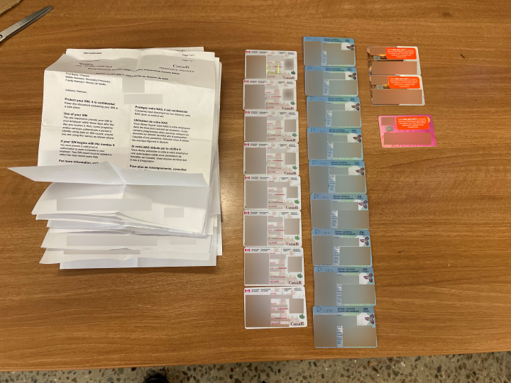 Officers seized 16 fraudulent social insurance number cards, eight fraudulent permanent resident cards, nine fraudulent Ontario driver's licences and three fraudulently-obtained credit cards.