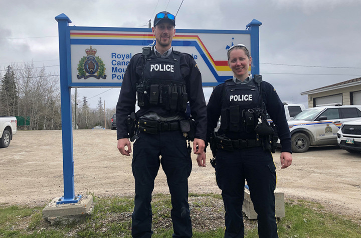 Consatable Dylan Fedrau and Constable Lindsay Bawn in front of the Norway House RCMP Detachment