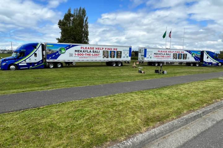 two truck/trailer rigs featuring photo of Mekayla Bali 