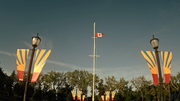 Canadian flag being lowered at Depot.