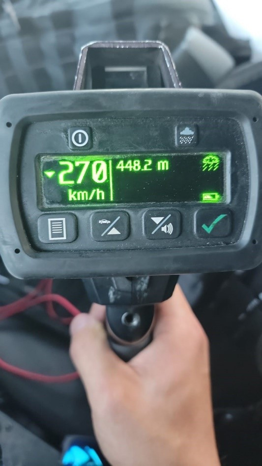 Radar speed gun showing the recorded speed of the vehicle as 270 km/h.