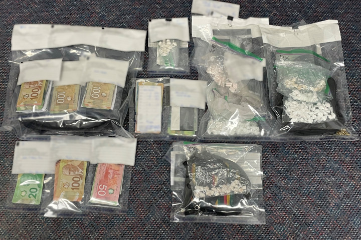 A quantity of cash, cocaine (108.60 grams), methamphetamine (72.6 grams)