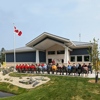 Photo of new detachment from outside with audience