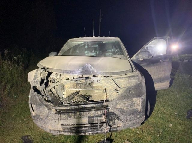 A photo of the damaged police vehicle.