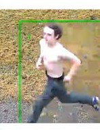 An image of a shirtless man wearing dark pants. He is running. 