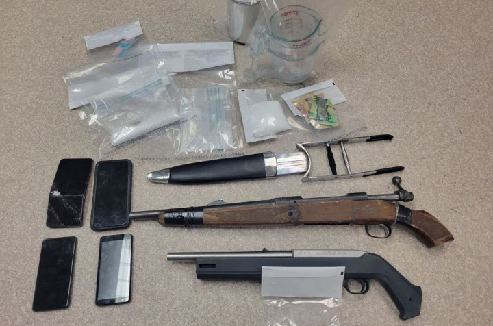 seized approximately 51 grams of fentanyl, 138 grams of an unknown substance, 13 grams methamphetamine, a sawed-off rifle and a rifle, ammunition, and other drug paraphernalia.