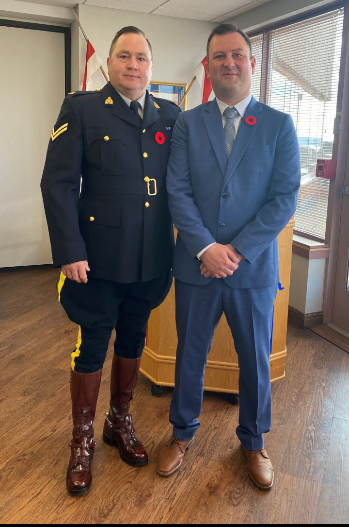 A photo of RCMP NL ProActive Recruiter Corporal Peter Gosse with Constable Mitchell Mercer at his swearing in ceremony, as part of the Experienced Police Officers program. 
