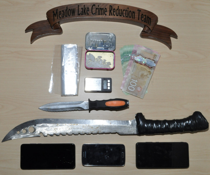 seized approximately 10 grams of methamphetamine, 13 pharmaceutical-style pills, a machete and trafficking paraphernalia
