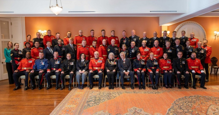 Photo of persons receiving Order of Merit