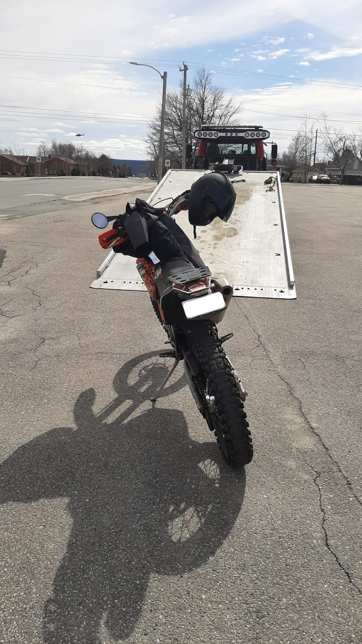 An image shows a parked motorcycle. 