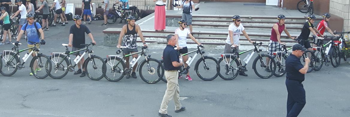 Line of police officers with mountain bikes.