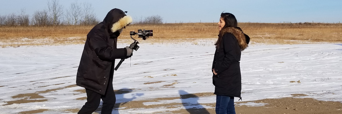 A girl is filmed as she sings. 